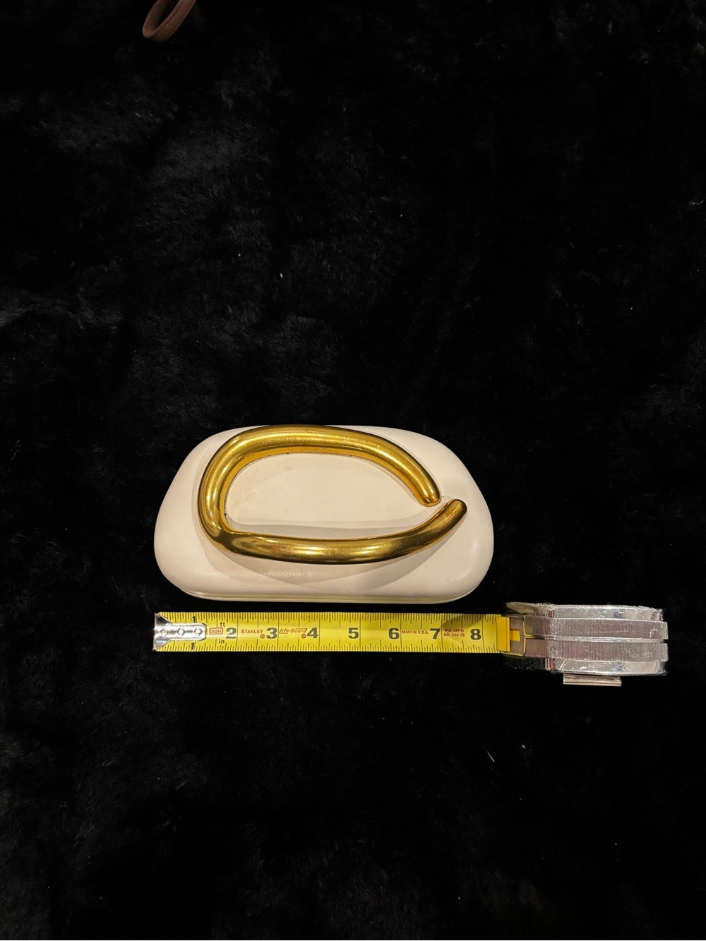 Gold Metal Handle Accent on Cream Ceramic Base